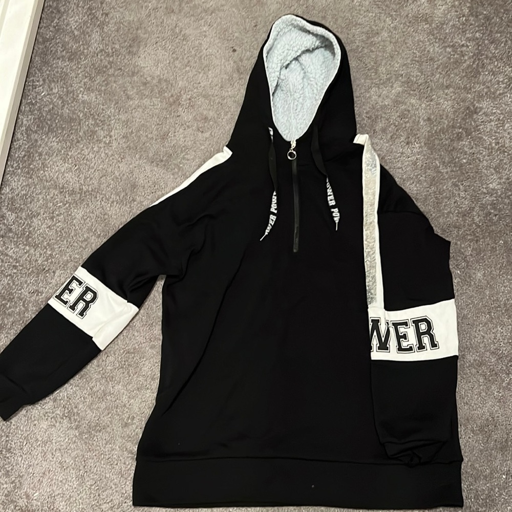 black “power” hoodie